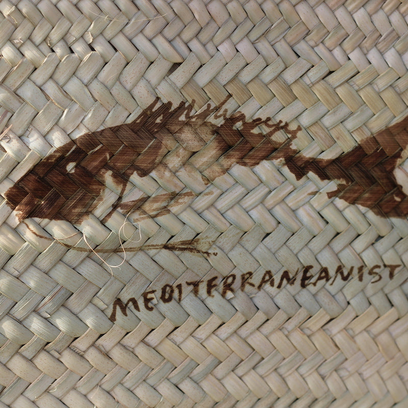 Mediterraneanist Logo en cesta de Mimbre